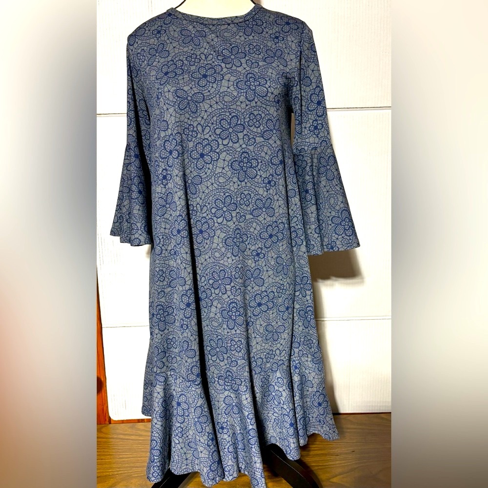 LuLaRoe dress in size small. Gray and navy blue flower print. Ruffle hem. 36.5 L